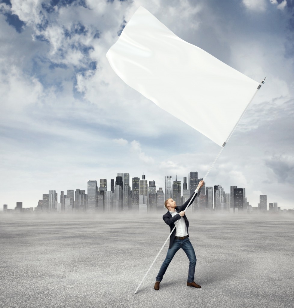 Fotolia 53927715 Subscription XXL 978x1024 Мужчина с белым флагом   Man with white flag