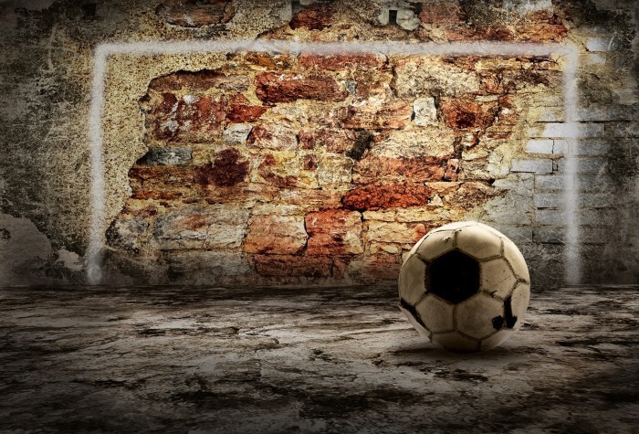 shutterstock 68884288 Футбольный мяч возле кирпичной стены   Soccer ball near a brick wall