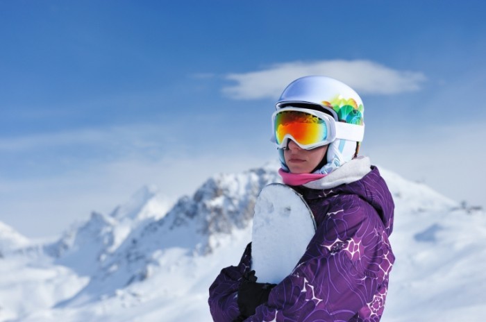 photodune 1607300 700x464 Женщина держит сноуборд   Woman holding a snowboard