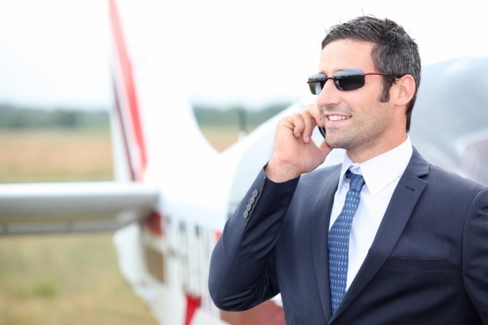 photodune 1703217 700x466 Мужчина на фоне личного самолета   Man on a background of personal aircraft