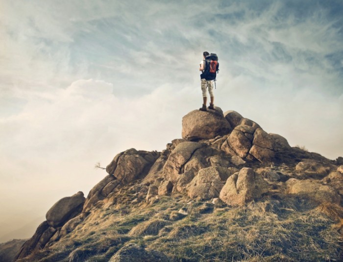 photodune 3834653 700x534 Турист в горах с рюкзаком   Tourist in mountains with a backpack