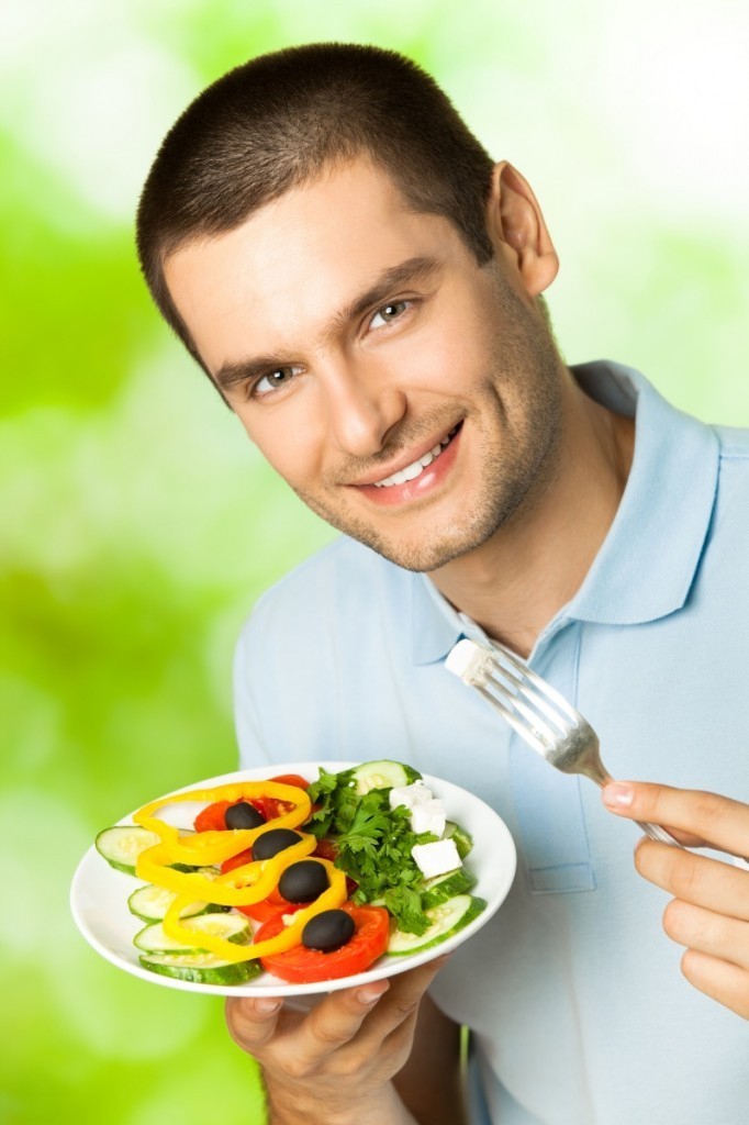 shutterstock 721047581 682x1024 Мужчина с греческим салатом   Man with a Greek salad