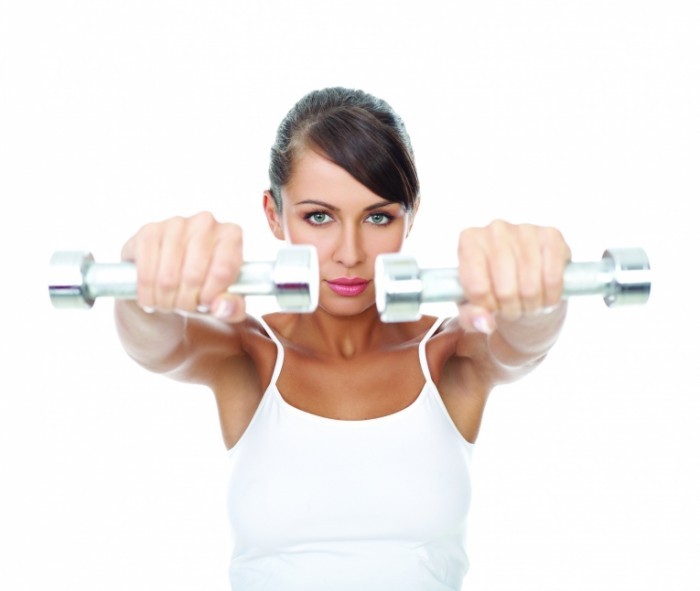 fotolia 12256931 nobandaid 700x591 Девушка с гантелями   Girl with dumbbells