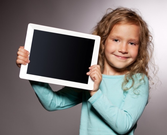 shutterstock 105496205 1024x832 700x568 Девочка с планшетом   Girl with a tablet