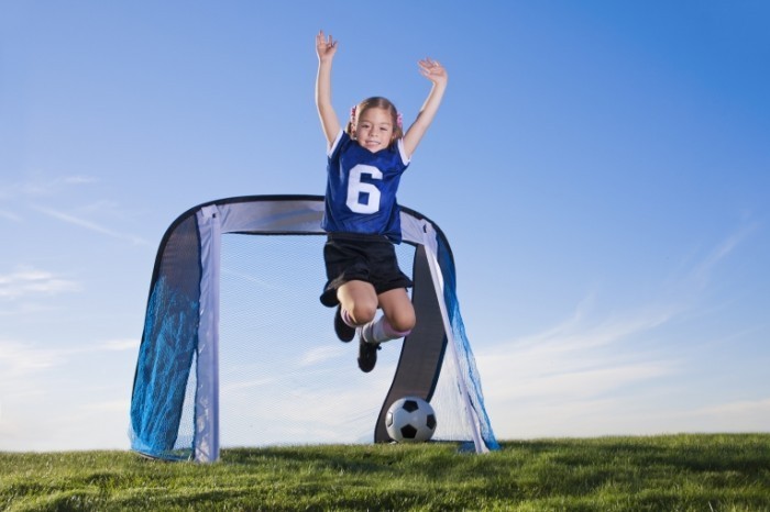 Fotolia 39263088 Subscription XL 700x466 Девочка с футбольным мячом   Girl with soccer ball