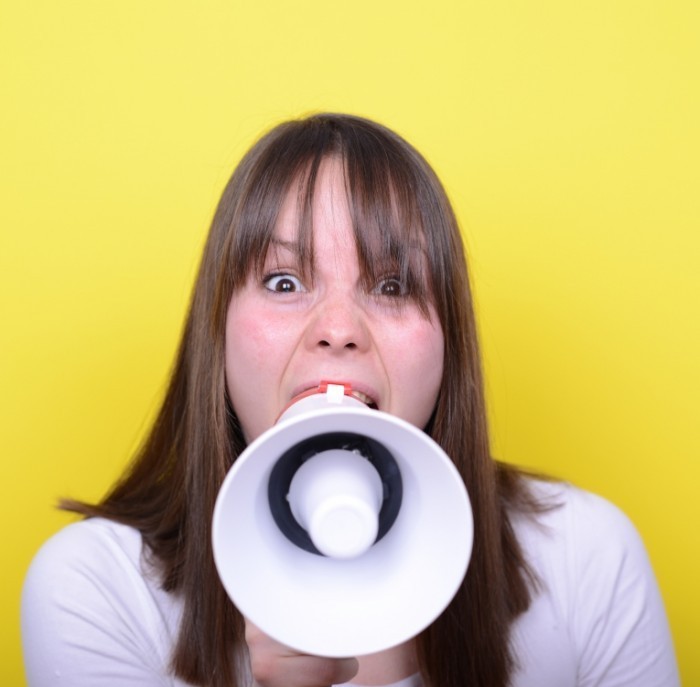 dollarphotoclub 65469600 700x687 Девушка с мегафоном   Girl with megaphone