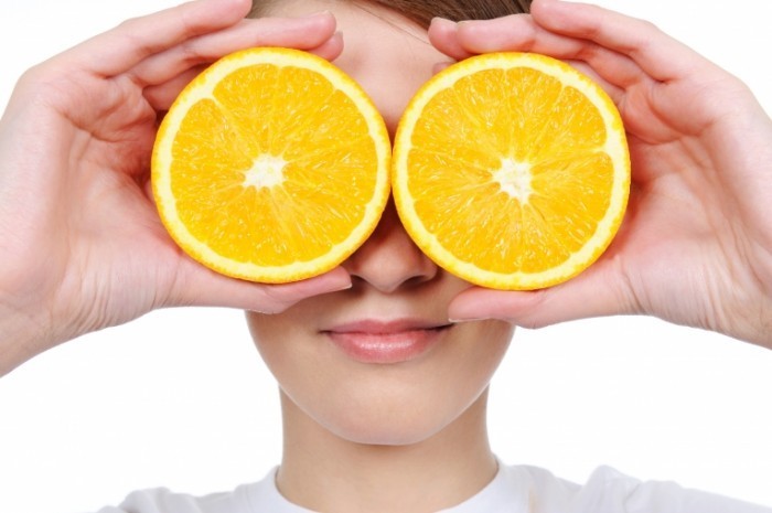 Depositphotos 1477127 L 700x465 Лицо девушки с апельсинами   Girls face with oranges