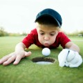 Мальчик с мячом для гольфа - Boy with a golf ball