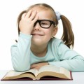 Девочка в очках за книгой - Girl in glasses with a book