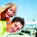 Счастливая пара на фоне самолета - Happy couple on the background of the airplane